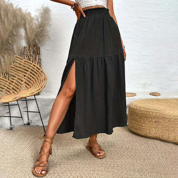 Shadow Black: Effortless black tiered maxis. Provides a relaxed fit with a bold side-opening for maximum comfort.