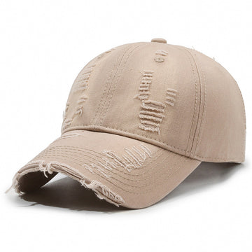 A versatile neutral with a rugged twist. Earthy tan tones with signature frayed edges and rips.