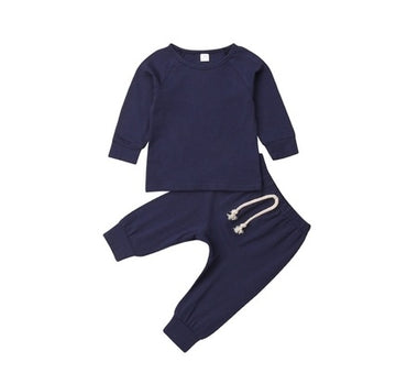 Classic Blue: The foundational navy blue set in a flat-lay view. Simplistic, modern design with premium stitching for long-lasting wear.