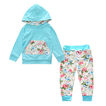 Sky Blue Garden: Refreshing light blue hoodie with a beautiful floral-print pocket. Paired with white floral leggings for a bright and cheerful daytime look.