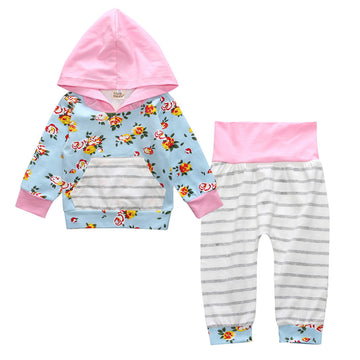 Blush & Grey: A sweet pink-hooded sweatshirt with a contrasting floral body. Includes matching striped and floral leggings for a trendy, mixed-pattern style.