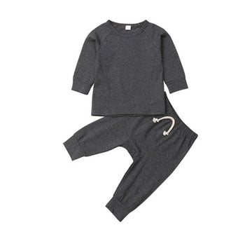 Classic Blue: The foundational navy blue set in a flat-lay view. Simplistic, modern design with premium stitching for long-lasting wear.