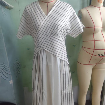 Pattern Close-up: Modern geometric embroidery meets traditional boho flair. Breathable fabric for all-day comfort.