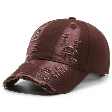Earthy coffee hue featuring signature "rip and tear" detailing. Classic vintage aesthetic.
