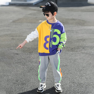Full Ensemble: Complete two-piece tracksuit in a soft cotton blend. Lightweight and breathable, making it a great choice for school or weekend adventures.