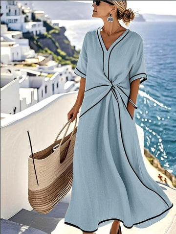 Summer Dream: Breezy short sleeves and a sweeping hemline. Ideally paired with sandals for a relaxed look.