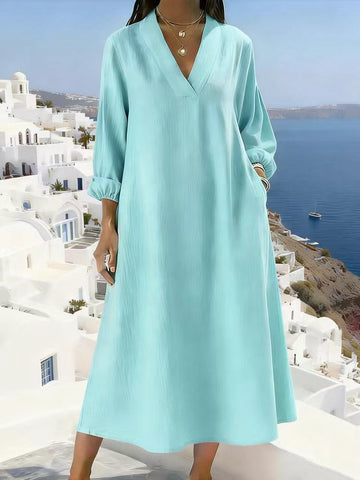 Aqua Breeze: Refreshing turquoise maxi dress. An airy, minimalist design ideal for beach getaways and sunny days.