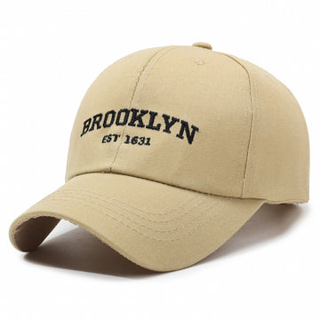 Earthy khaki tone with bold Brooklyn stitching. The perfect neutral for everyday wear.