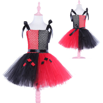 Tiered Elegance: A sophisticated take on the jester look with high-contrast panels and a voluminous, flared skirt.