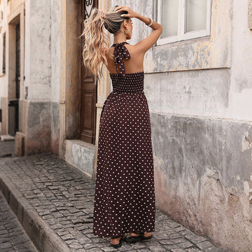 Open-Back Detail: Stunning backless design with a flattering cinched waist. A sophisticated silhouette for summer evenings.