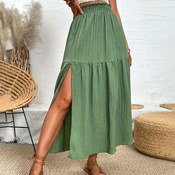 Meadow Green: Tiered sage skirt featuring a high side slit. Flattering, flowy, and ideal for warm-weather styling.