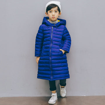 Royal Azure: Bright cobalt blue puffer jacket with a protective hood. A durable and warm essential for school and outdoor play.