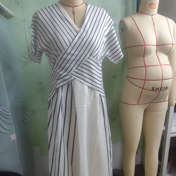 Detail View: Intricate blue and gold patterns on a crisp white base. High-quality stitching for a premium feel.