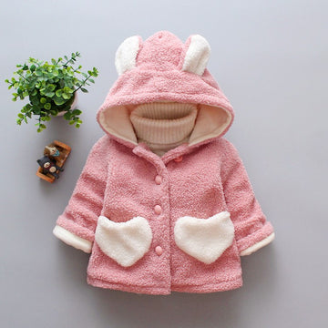 Blush Sherpa: Soft pastel pink jacket crafted from premium teddy fleece. Designed with a secure button-front and a snug, hooded fit.