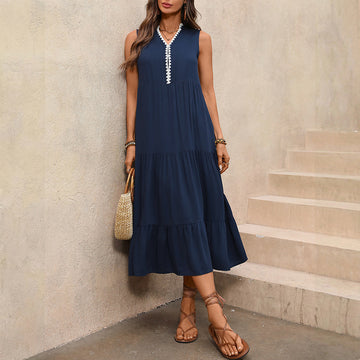 Resort Ready: Sophisticated navy blue gown with a relaxed fit. Breathable fabric perfect for seaside strolls.