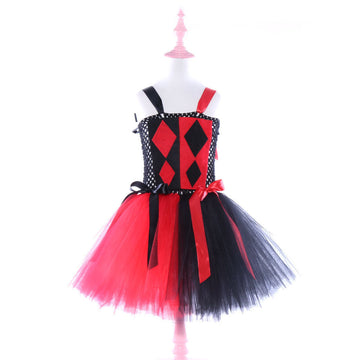 Checkered Charm: Eye-catching diamond motif with a layered tulle skirt. Features a comfortable, stretchy bodice for the perfect fit.